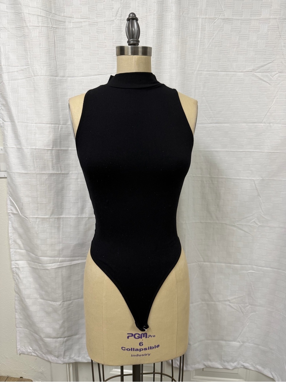 Sleek Black Mock Neck Sleeveless Bodysuit